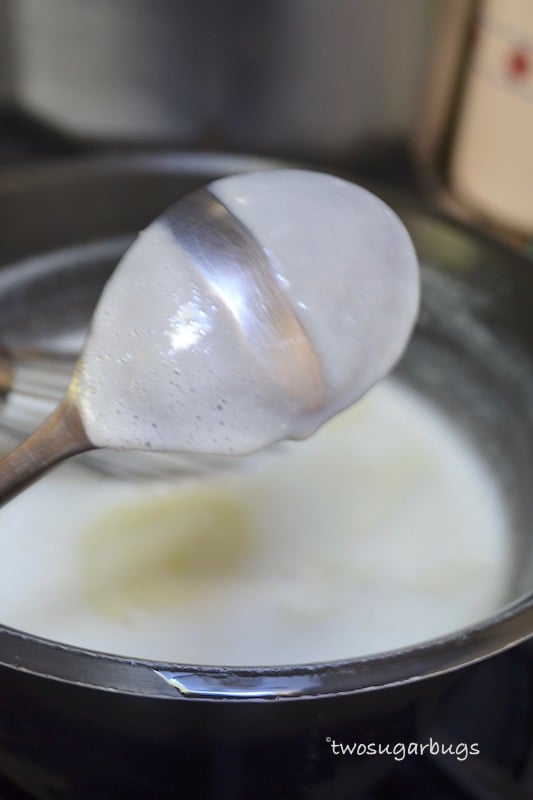 Spoon showing correct thickness of ice cream base