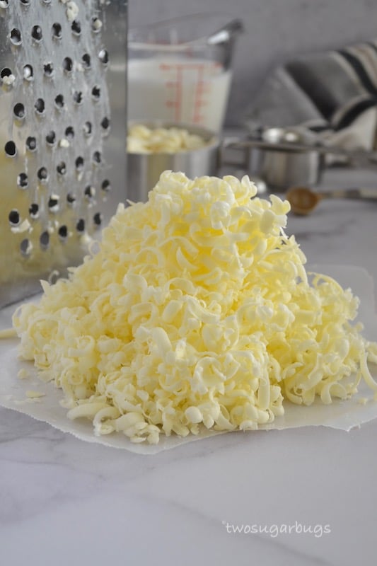 Grated butter on wax paper