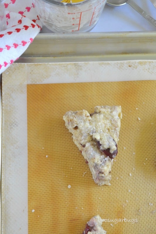 Unbaked scone on prepared baking sheet