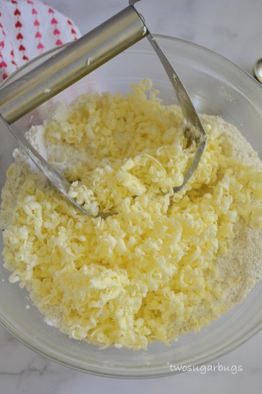 Grated butter on top of dry ingredients