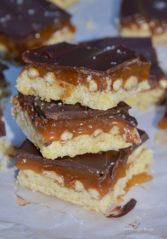 stack of chocolate caramel slice bars made with traditional homemade caramel