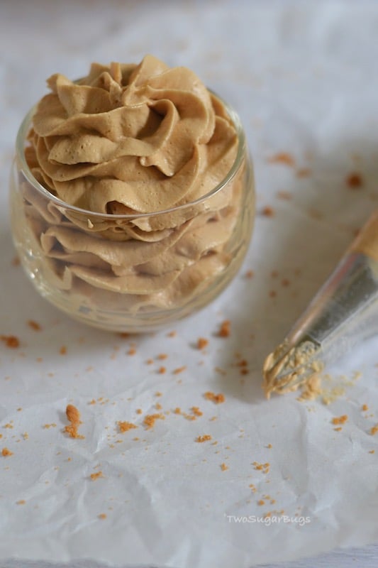 Glass filled with cookie butter frosting