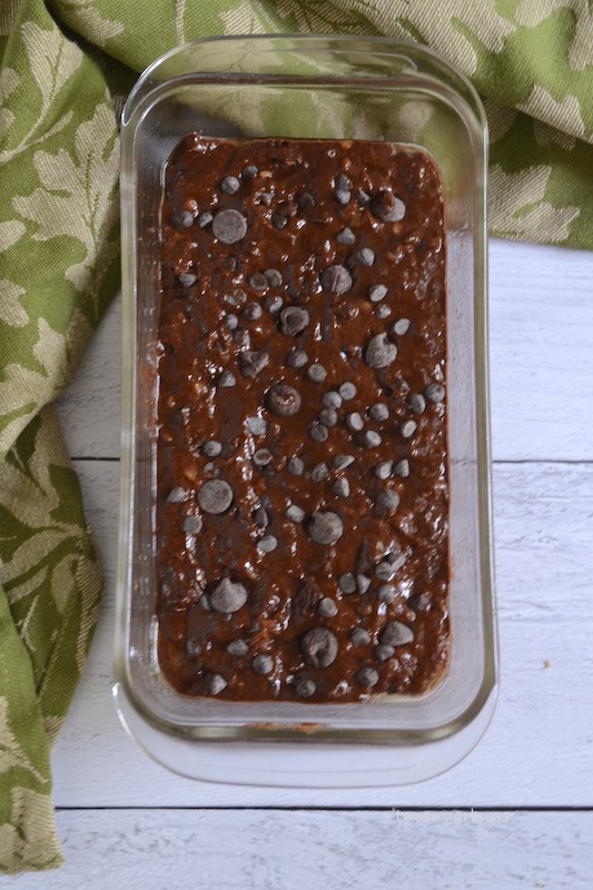 Healthy chocolate zucchini bread batter in loaf pan