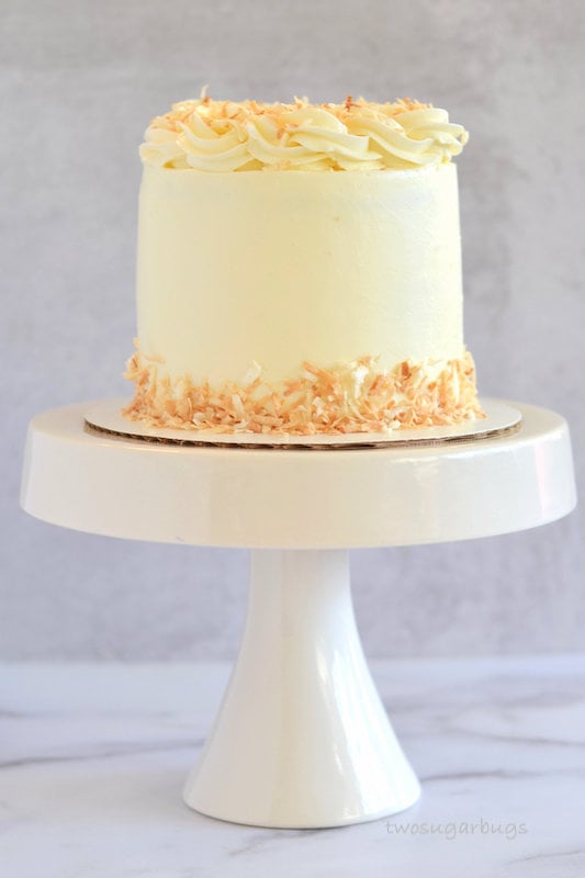 Perfect coconut cake on a cake stand