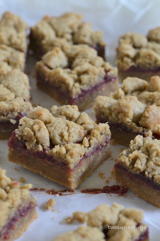 Sunbutter and jelly bars, cut in squares on parchment paper