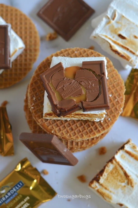 Overhead shot of s'mores made with homemade marshmallows, stroopwaffles and Ghiradelli caramel chocolates.