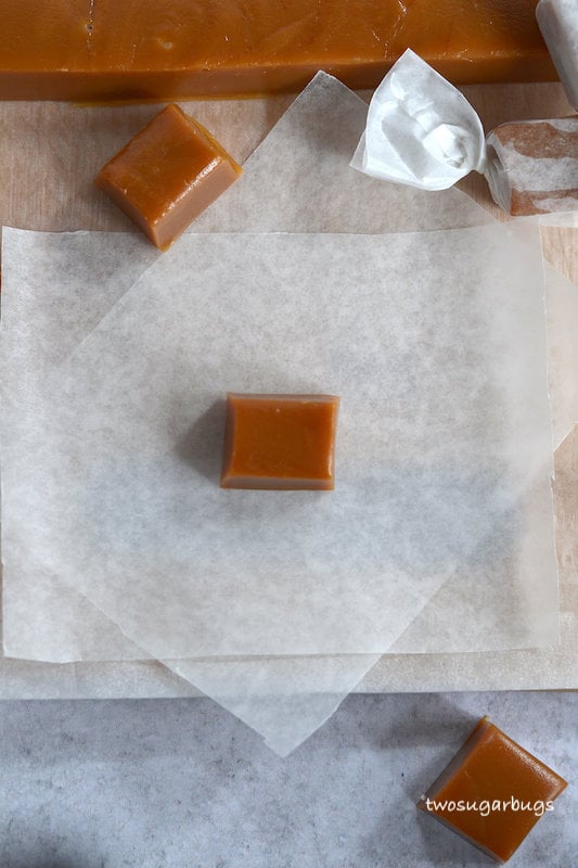 caramel centered on wax paper rectangle