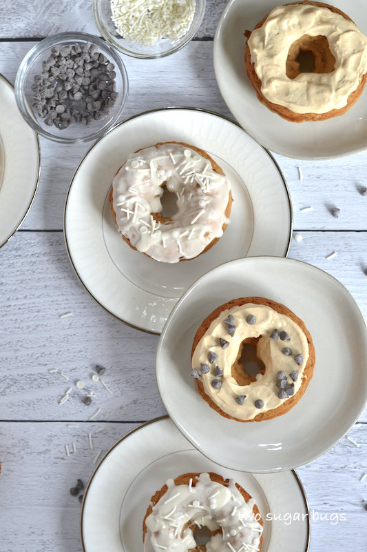 four plates with donuts glazed two ways