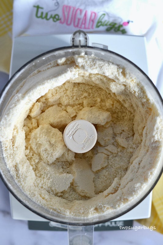 dry ingredients and butter and cream cheese in a food processor