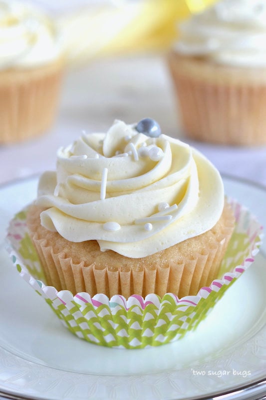 cupcake on a plate with colorful wrapper