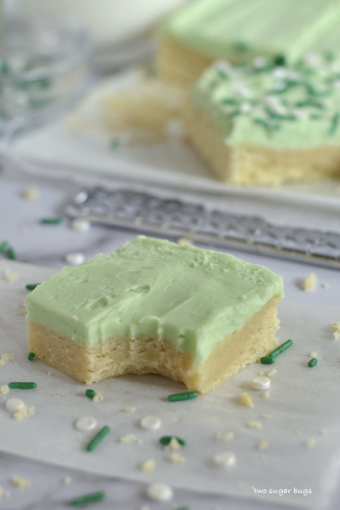vanilla mint sugar cookie bar with a bite missing