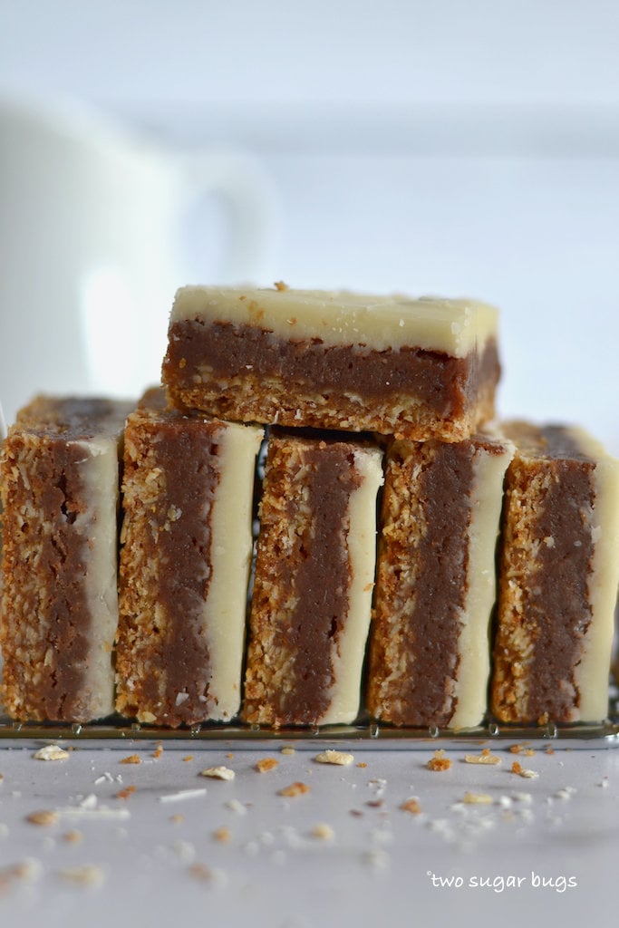 Oat bottom layered brownies on a cooling rack