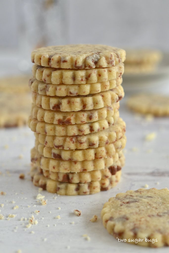 a stack of sugar cookies made with milk chocolate