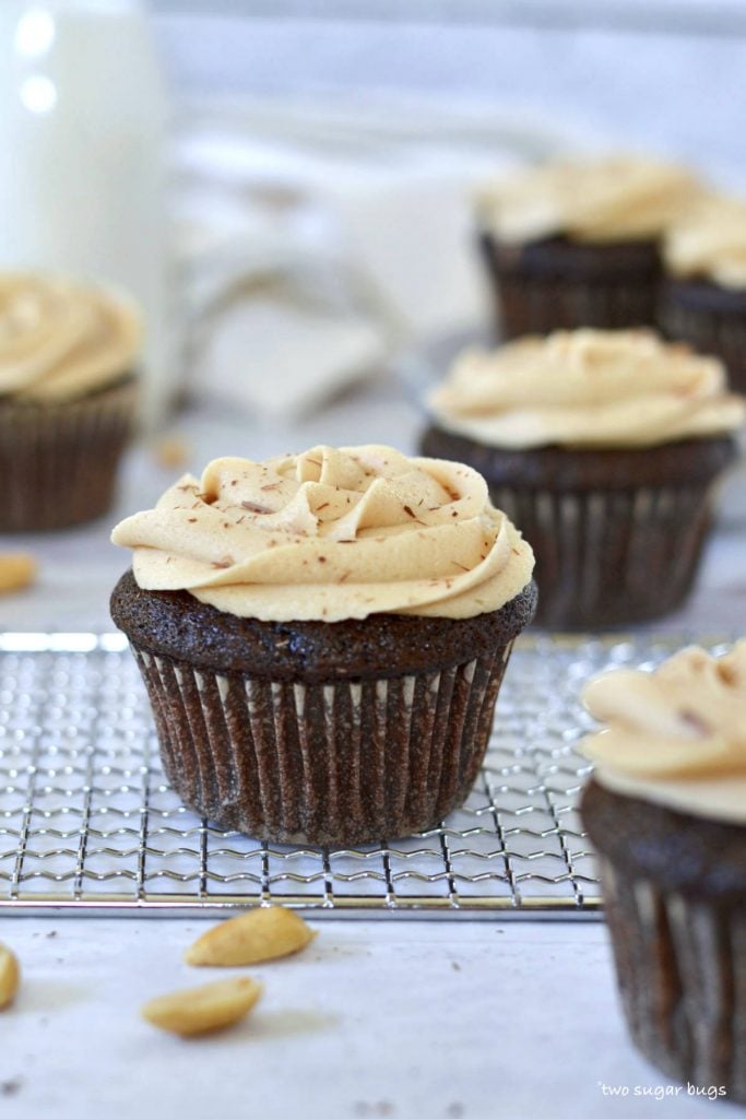 chocolate peanut butter cupcake on a cooling rack