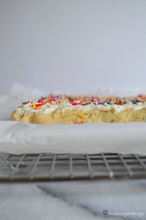sugar cookie bars on a wire rack