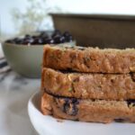 Wholesome and healthier zucchini blueberry bread. You'll feel good feeding this one to your family! #twosugarbugs #zucchinibread #healthierzucchinibread #breakfastisserved