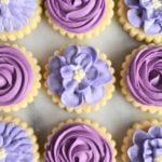 Purple buttercream frosted sugar cookies