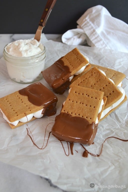 Homemade graham crackers are perfect for homemade s'mores or animal crackers. You may never go back to store bought!#twosugarbugs #homemadegrahamcrackers #grahamcrackers #smores