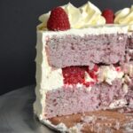 Inside view of a slice of raspberry cake