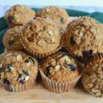 Hearty whole wheat blueberry oat muffins. Perfect for breakfast! #twosugarbugs #blueberryoatmuffin #muffin #breakfastisserved