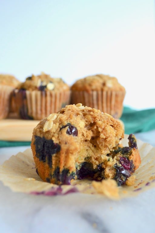 Hearty whole wheat blueberry oat muffins. Perfect for breakfast! #twosugarbugs #blueberryoatmuffin #muffin #breakfastisserved