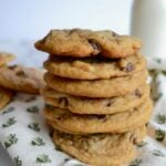 Chocolate chippers, slightly thick with a soft chewy center and barely crisp edges. Everyone is going to ask you for this recipe! #twosugarbugs #chocolatechipcookies #cookiesandmilk #familyrecipe