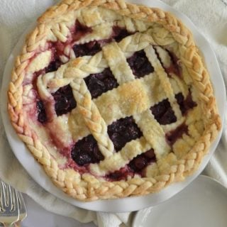 Overhead shot of blackberry cherry pie.