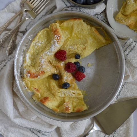 Overhead shot of Easiest Dutch Baby Ever with fresh berries on top