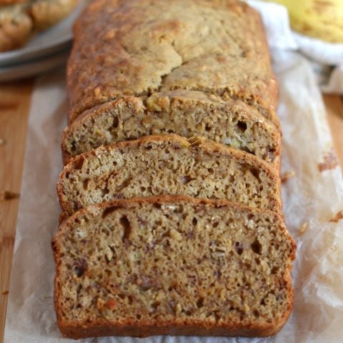 Sliced banana bread on parchment paper