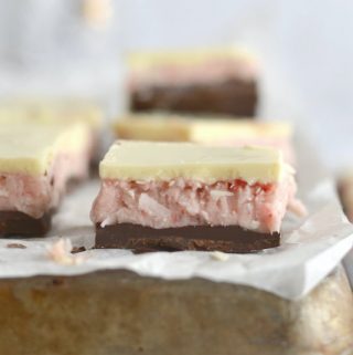 strawberry coconut chocolate bar sitting on a baking sheet pan