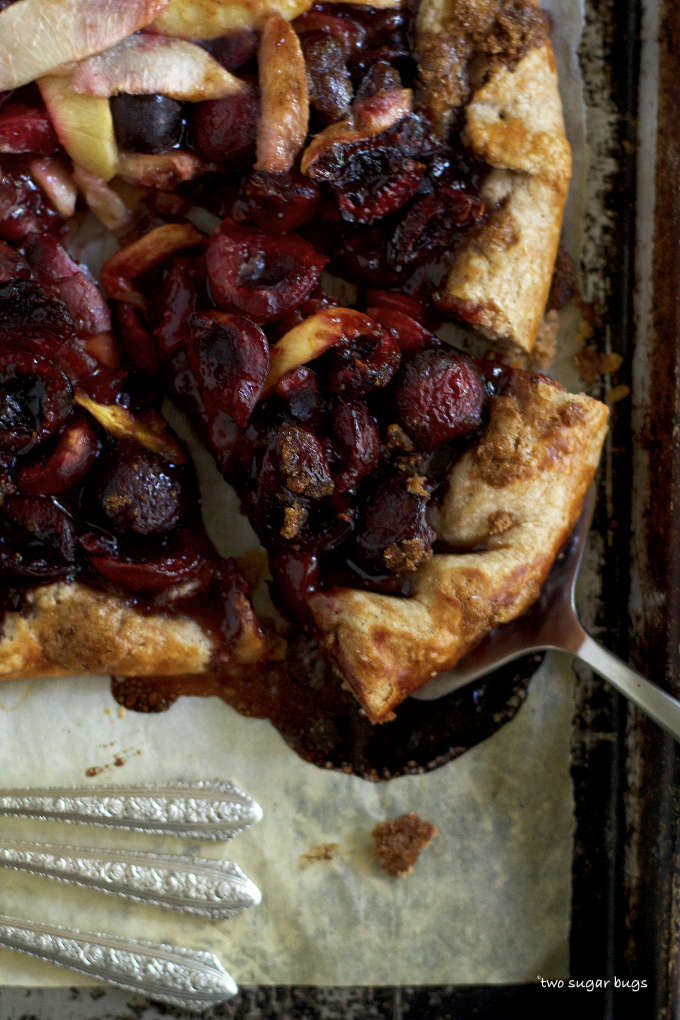 slice of cherry nectarine crostata on a serving spatula