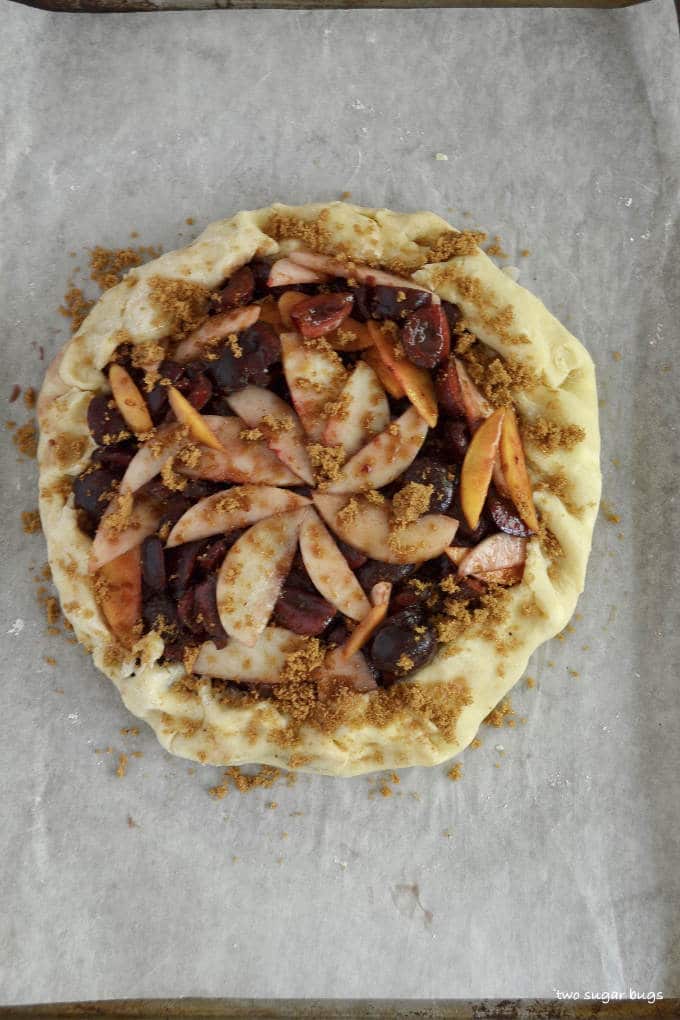 unbaked crostata on a baking pan