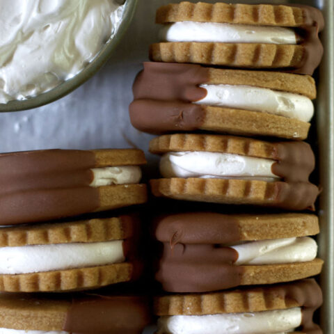 homemade s'mores bars lined up on a baking sheet