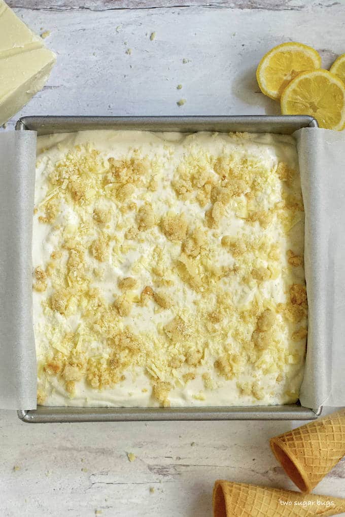parchment lined baking pan with ice cream