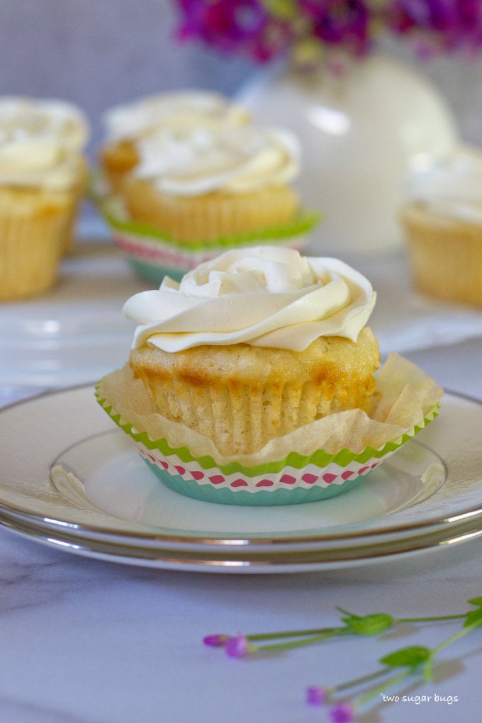 cupcake with a buttercream swirl on a plate