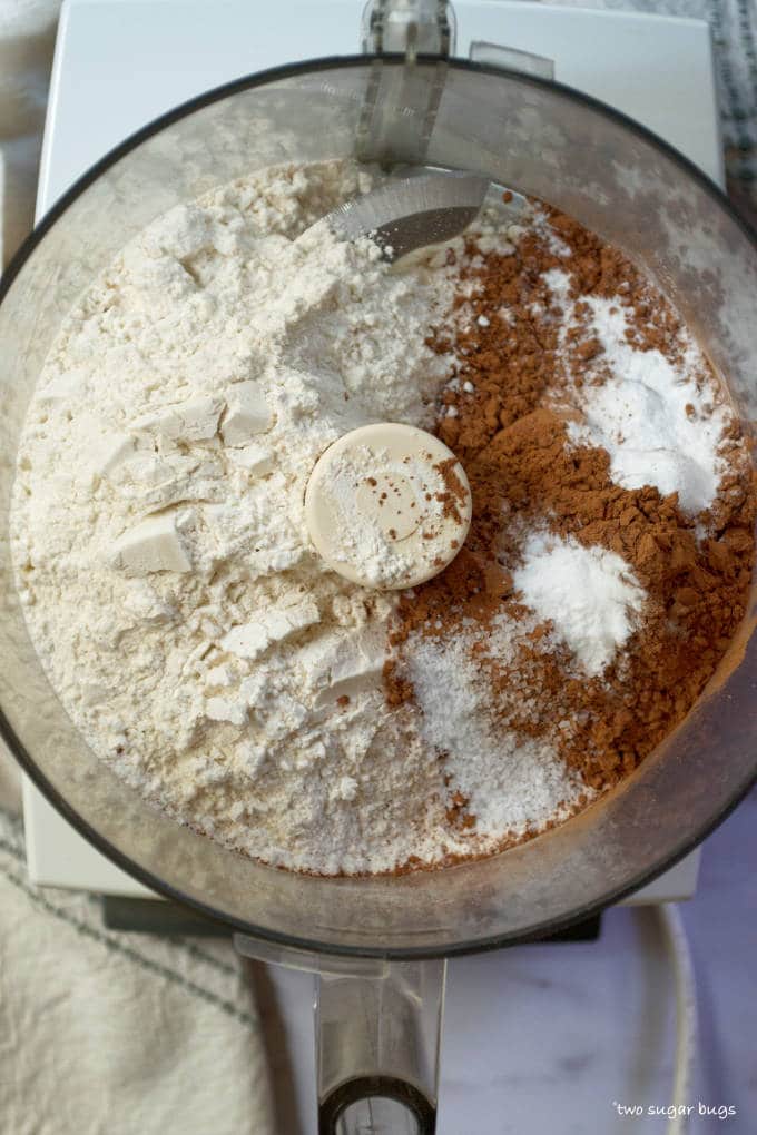 flour, cocoa powder, baking soda, baking powder and salt in a food processor