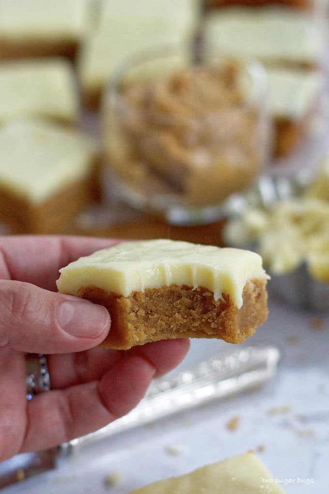 hand holding a blondie with a bite missing