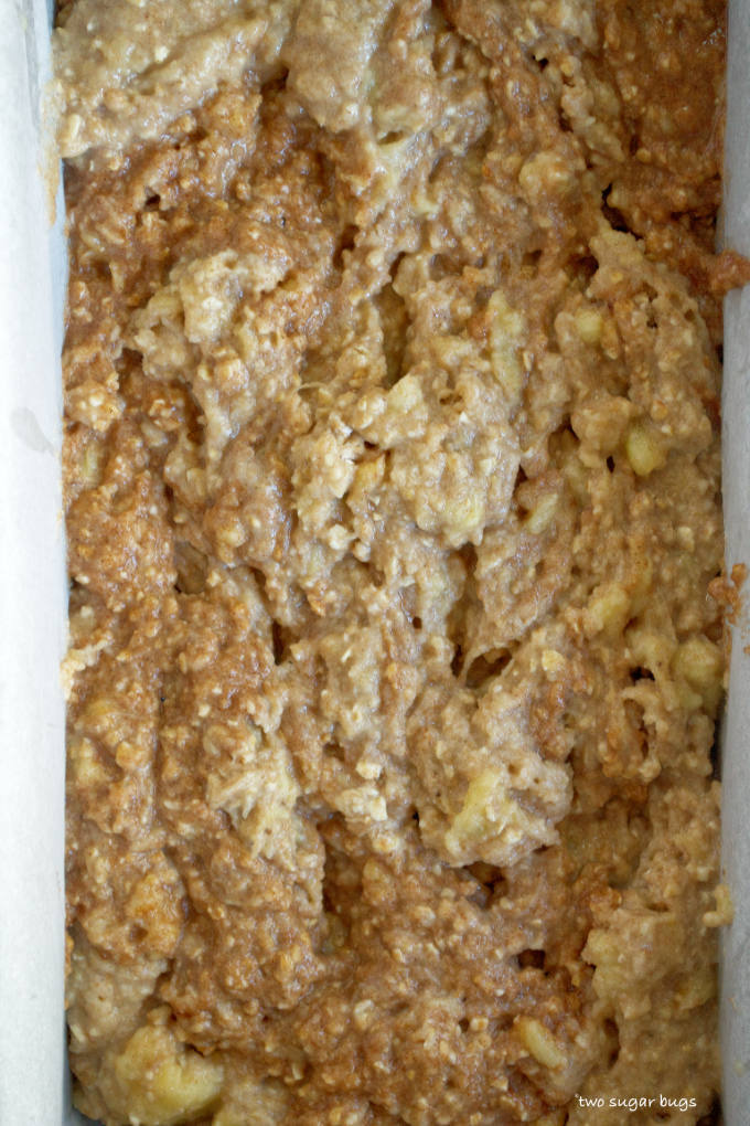 swirled apple cider banana bread batter in a loaf pan