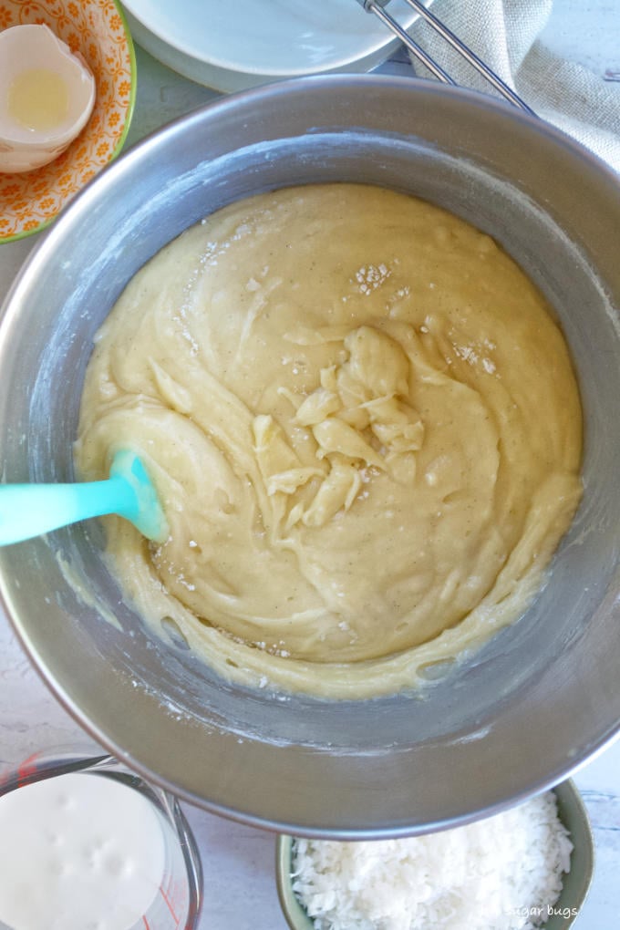 cake batter in a mixing bowl before coconut is added