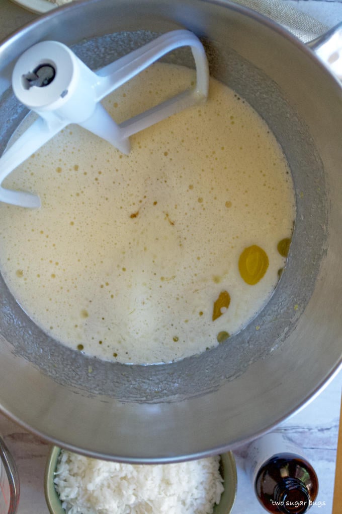eggs, sugar, vanilla, butter and oil in a mixing bowl