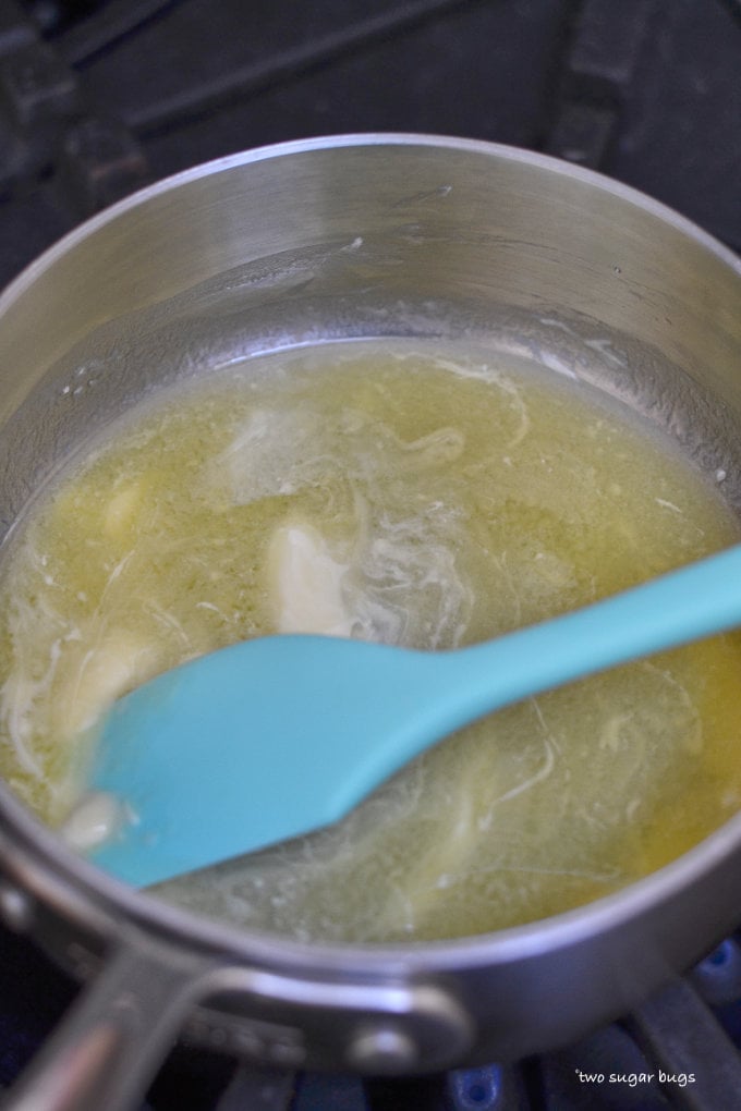 butter and white chocolate melting in a saucepan