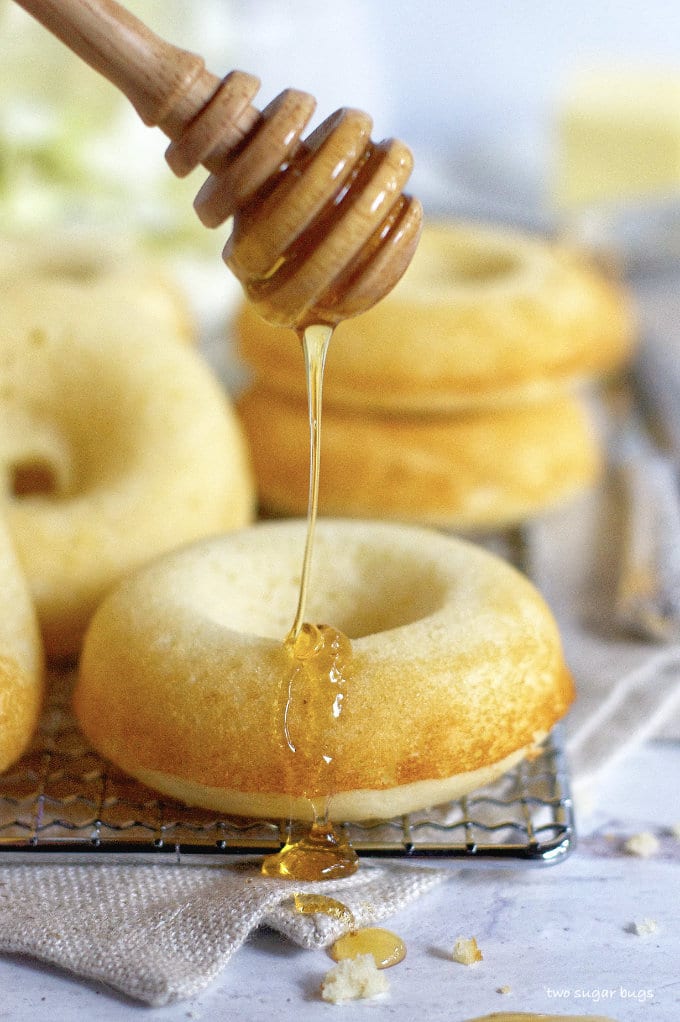 donut being drizzled with honey