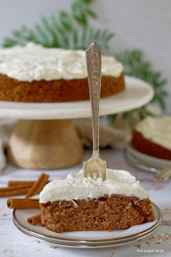 a slice of homemade apple spice cake with a fork in it