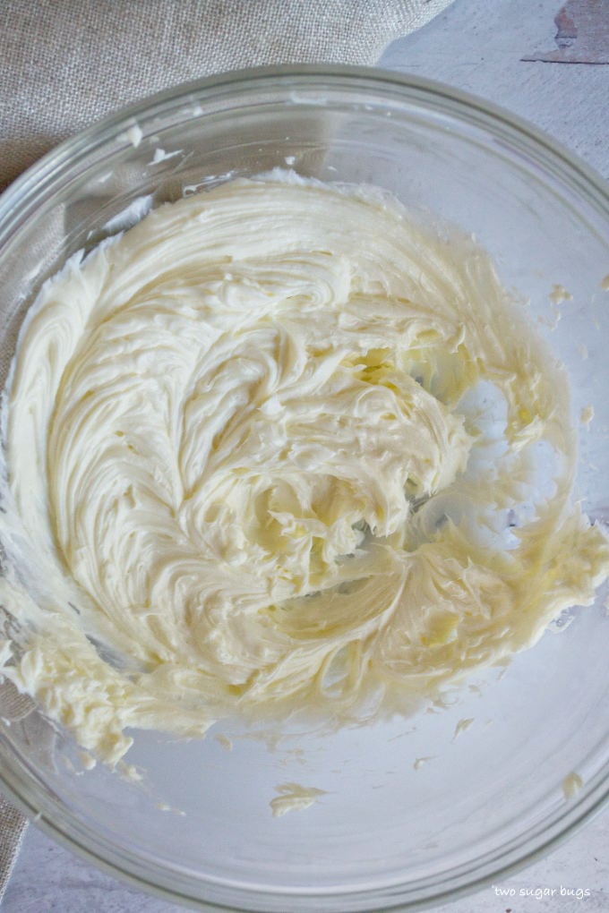 whipped cream cheese and butter in a glass bowl