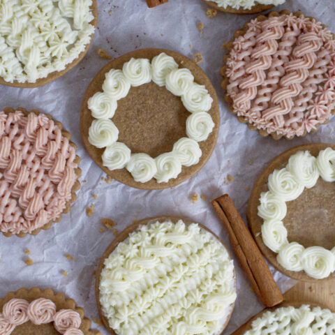 decorated soft gingerbread cookies on parchment paper