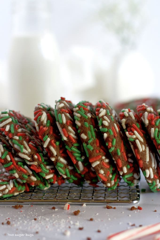 cookies with sprinkles lined on a cooling rack
