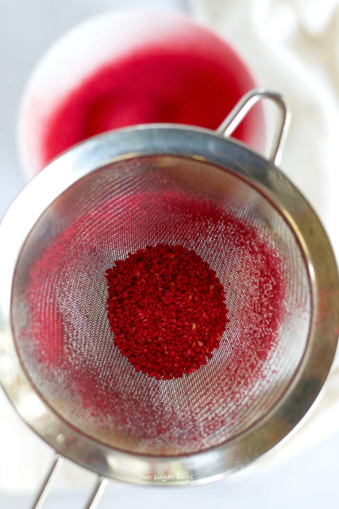 raspberry seeds in a colander