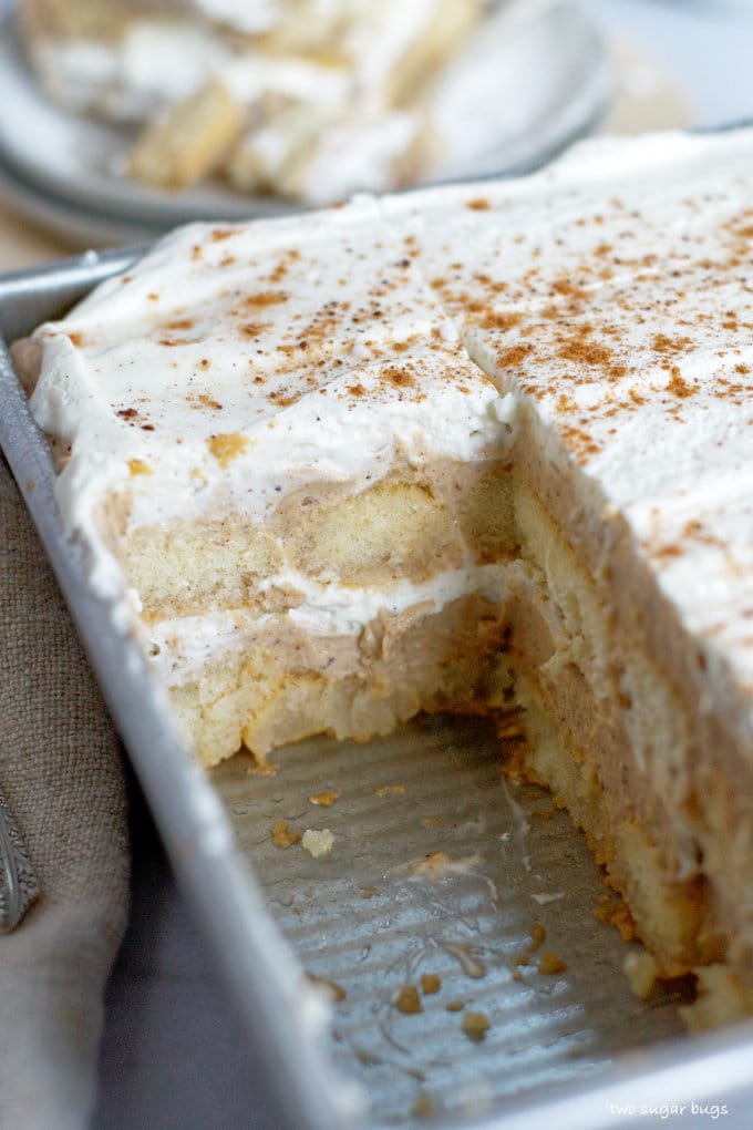 slice missing out of a pan of tom and jerry's dessert tiramisu