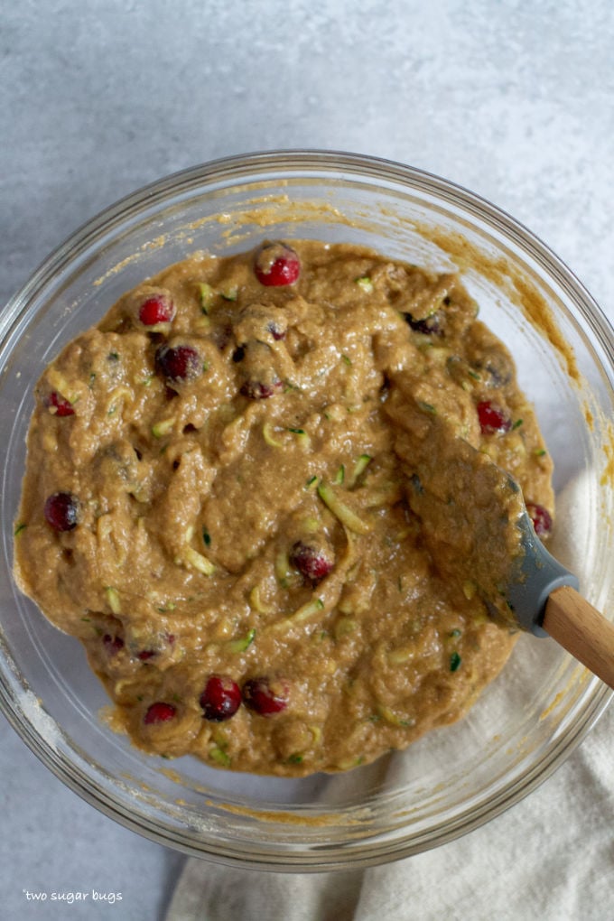 whole wheat cranberry zucchini bread batter in a bowl