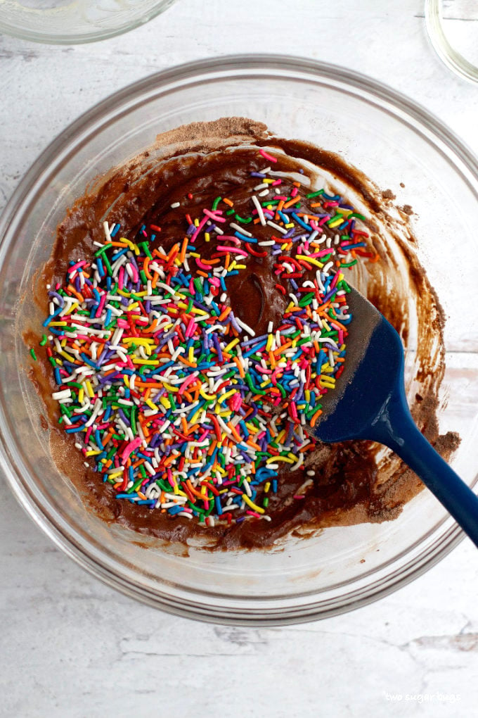 sprinkles added to batter in a mixing bowl
